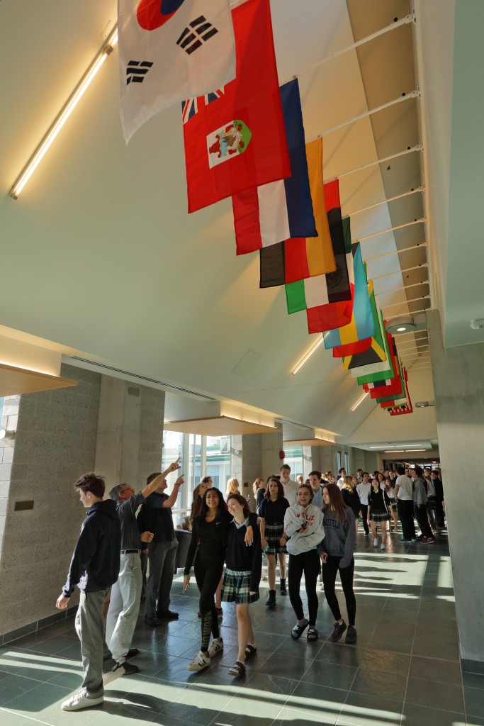 Flags in the Hall of Nations celebrate different cultures